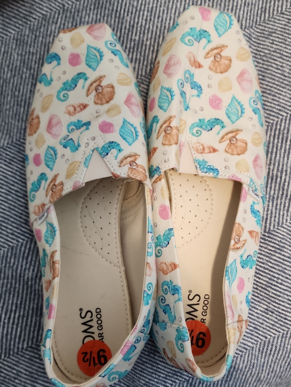 TOMS Ivory Canvas Slip-Ons with Aqua Pink and Tan Seashell Print